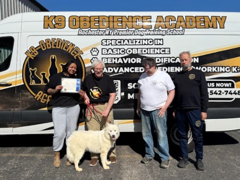 K9 Obedience Academy graduation photo with van Rochester NY